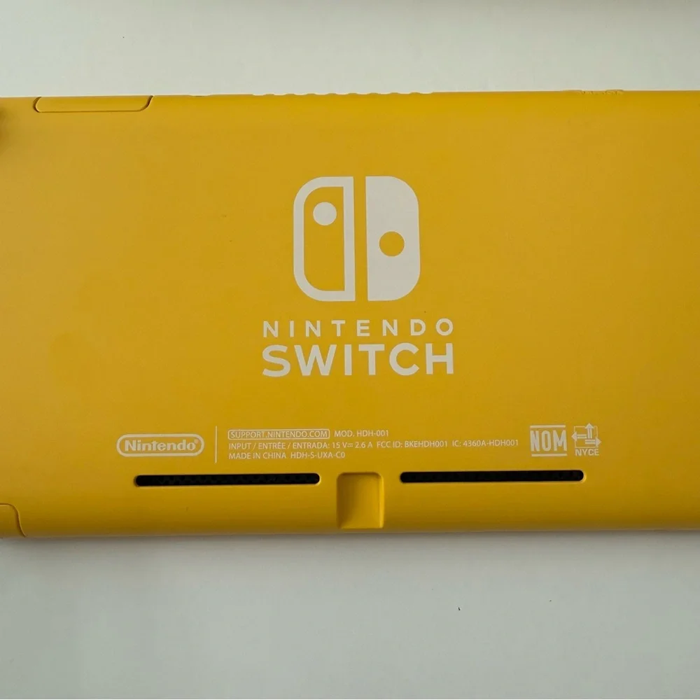 Nintendo Switch Lite in Yellow with Accessories